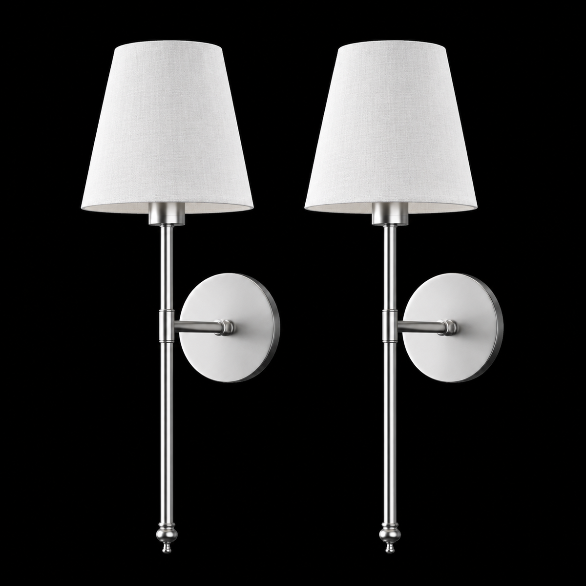 A pair of modern wall sconces with tapered white fabric shades and polished silver metal stems, displayed side-by-side against a solid black background.