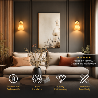 A modern living room scene with a beige sofa, warm wall sconces, a framed botanical wall art piece, and a dark round coffee table. A dark translucent banner overlays the lower right with customer trust text and stars, and the lower left contains feature icons and text: 'Wireless and Rechargeable,' 'Easy Installation,' 'Quality Craftmanship,' and 'Modern & Sleek Design.