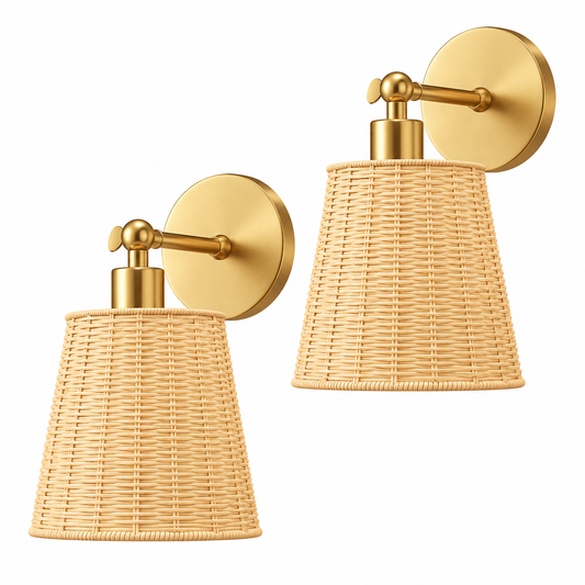 Two matching wall sconces with woven natural rattan shades and brushed gold metal fixtures, shown on a plain white background.