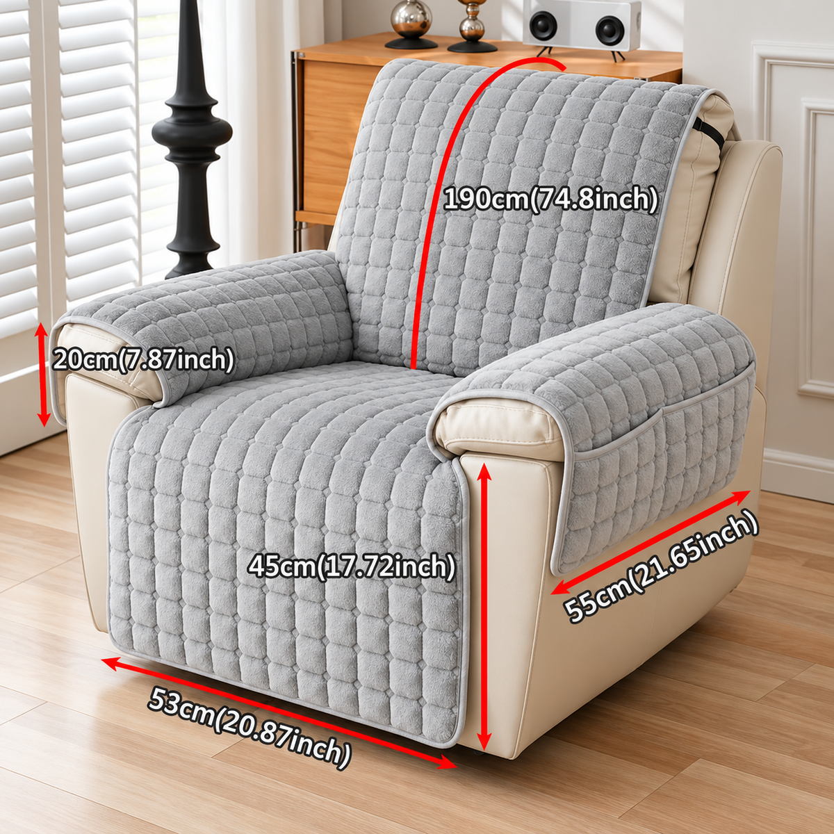 A quilted light gray recliner slipcover shown on a cream recliner chair in a living room setting, with red measurement lines and text indicating dimensions of the cover.