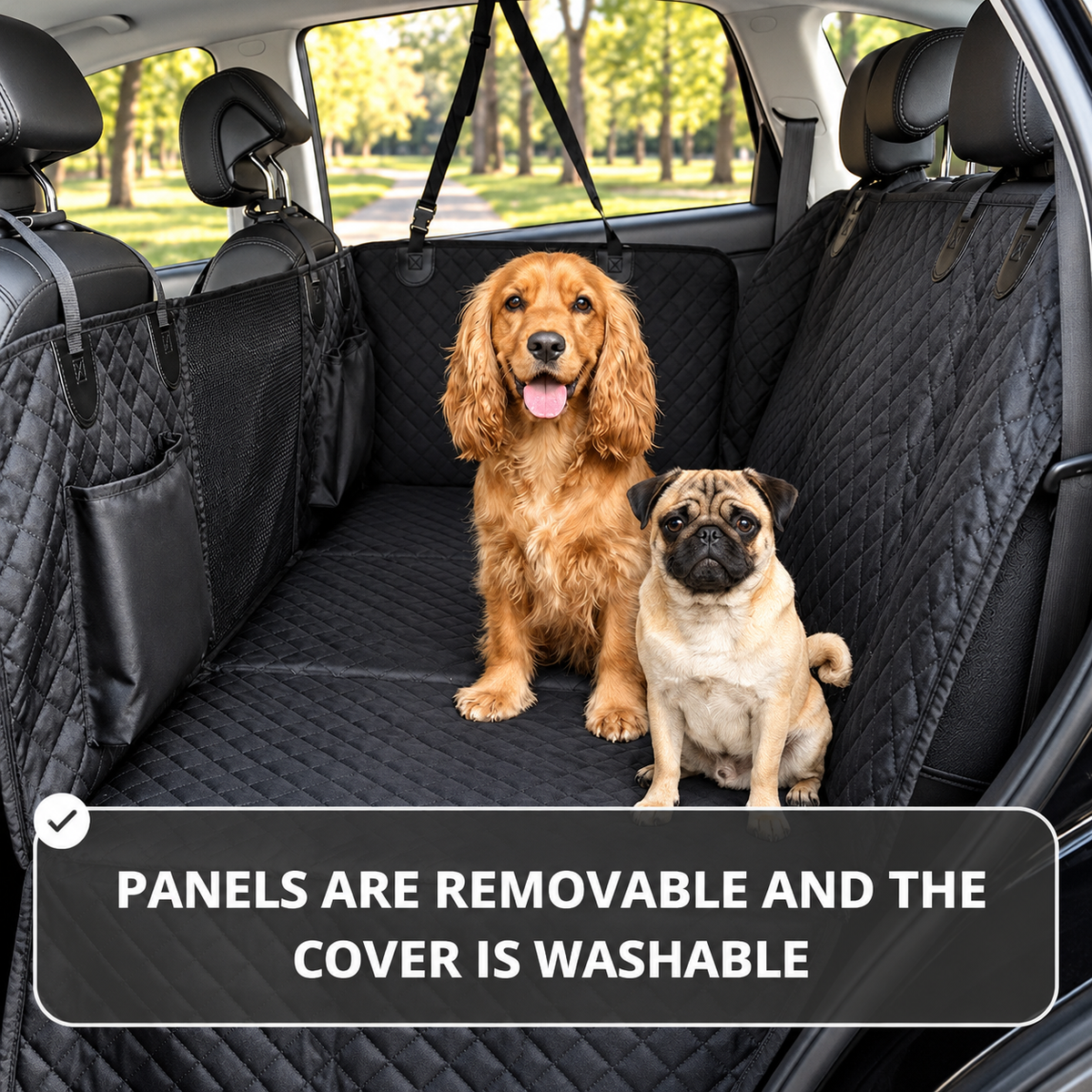Black car trunk liner cover installed in the back of a vehicle, shown with two dogs sitting on the cover. The product includes a quilted floor mat, side panels, mesh divider, and rear seat covers.
